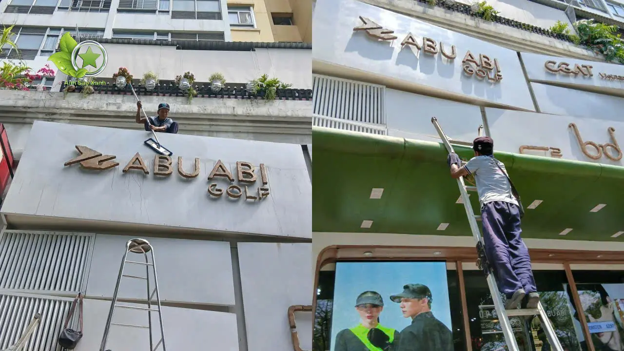 Nhân viên thi công vệ sinh bảng hiệu alu ngoài trời tại Quận 7